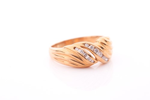 Lot 171 - An 18ct yellow gold and diamond ring, the...