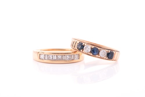 Lot 403 - An 18ct yellow gold and diamond ring, channel...