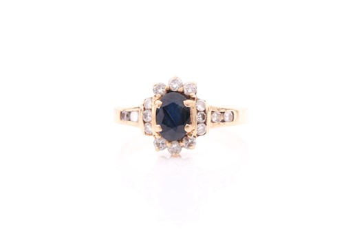 Lot 458 - An 18ct yellow gold, diamond, and sapphire...