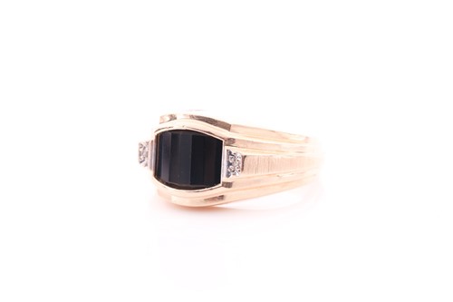 Lot 2 - A gents yellow metal and onyx ring, set with a...