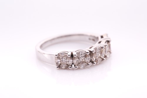 Lot 219 - An 18ct white gold and diamond cluster ring,...