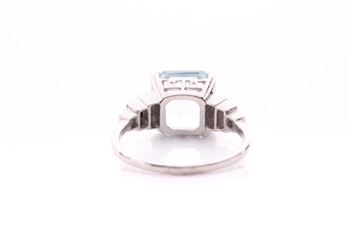 Lot 34 - A platinum, diamond, and aquamarine ring, set...