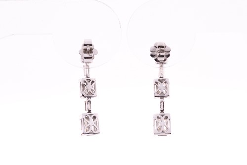 Lot 131 - A pair of 18ct white gold and diamond drop...