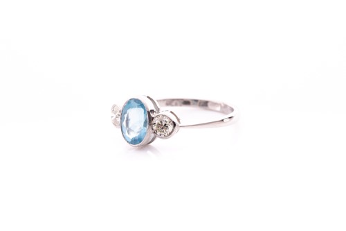Lot 78 - A platinum, diamond, and aquamarine ring,...