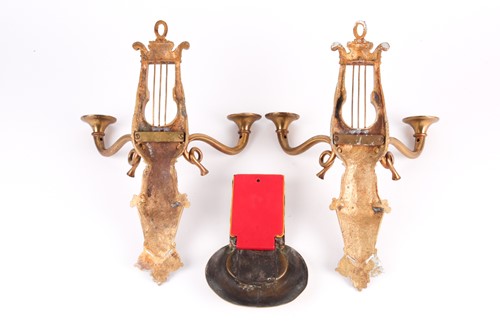 Lot 202 - A pair of gilt bronze wall sconces, in the...