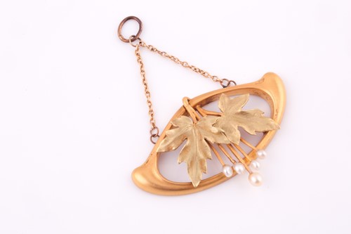 Lot 260 - An Art Nouveau style pendant, suspended from...