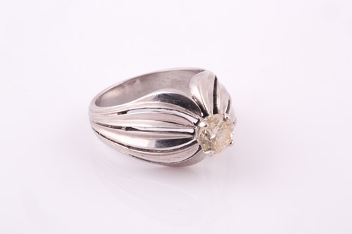 Lot 5 - A 1950's solitaire diamond ring, set in white...
