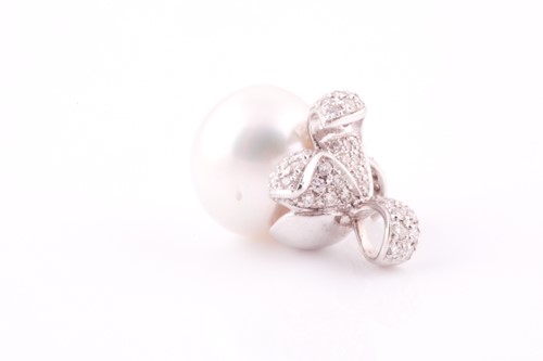 Lot 231 - A South Sea pearl and diamond pendant, the...
