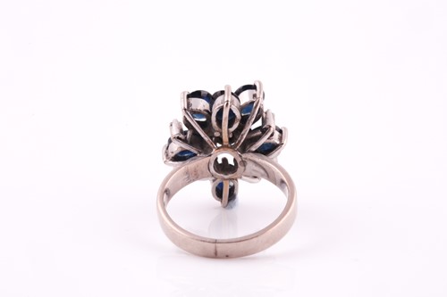 Lot 47 - A 1970's sapphire and diamond cluster ring,...