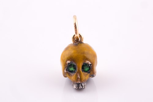 Lot 50 - An unusual enamel skull pendant, the silver...