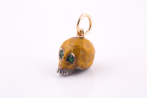 Lot 50 - An unusual enamel skull pendant, the silver...