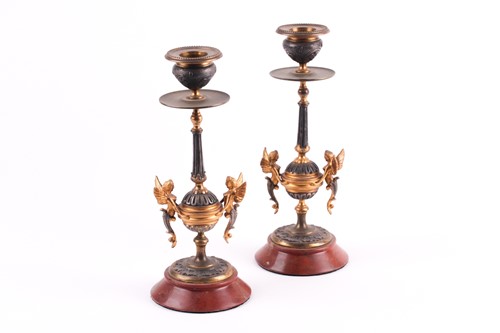 Lot 203 - A pair of French Empire period brass and...