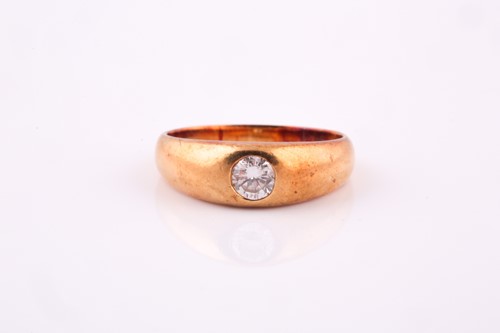 Lot 28 - A yellow metal and diamond ring, set with a...