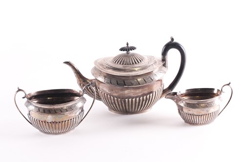 Lot 41 - A late Victorian three-piece silver teaset,...