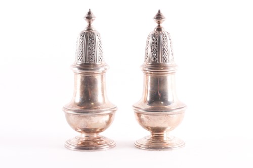 Lot 40 - A pair of QEII silver caster, London 1966 and...