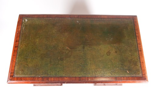 Lot 129 - An Edwardian mahogany kneehole writing desk....