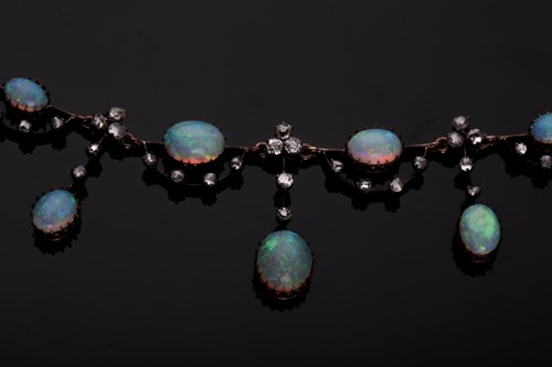 Lot 422 - An Edwardian opal and diamond fringe necklace,...