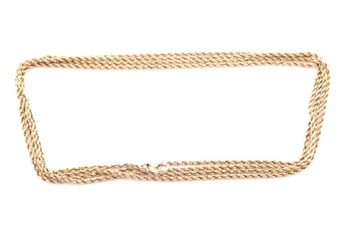 Lot 347 - A yellow metal rope-twist muff chain, the...
