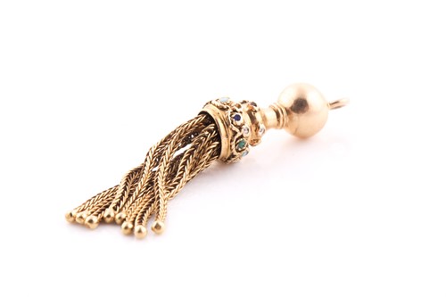 Lot 214 - A yellow metal tassel pendant, with eight rope-...
