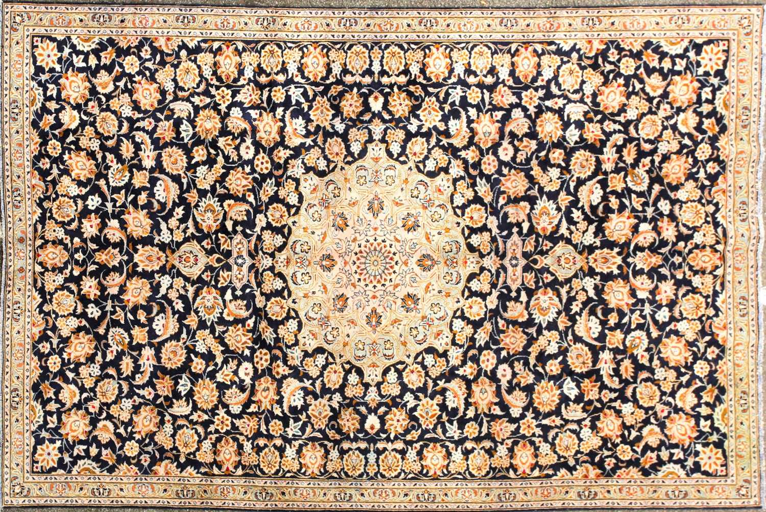Lot 176 - A royal blue ground Kashan carpet with an...