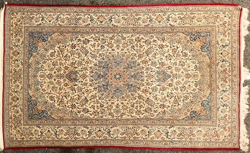 Lot 181 - An ivory ground Isfahan rug with a barbed...