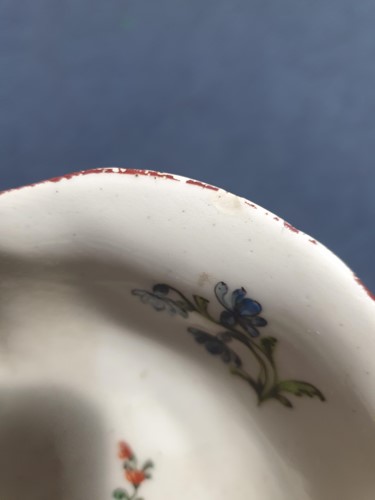 Lot 24 - An 18th century porcelain wall pocket,...