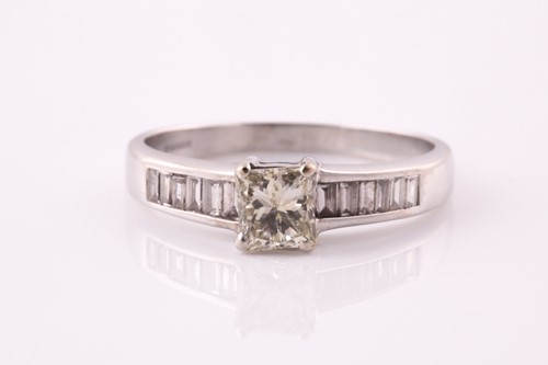 Lot 158 - A single stone diamond ring; the princess cut...