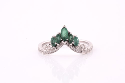 Lot 394 - An emerald and diamond ring; the 'V' shaped...