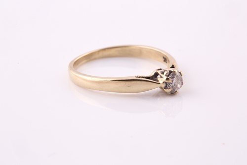 Lot 79 - A single stone diamond ring; the round...