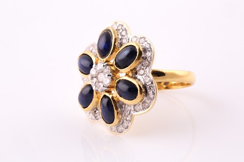 Lot 41 - A sapphire and diamond foliate cluster ring;...