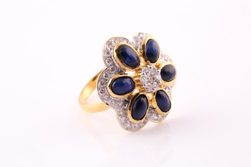 Lot 41 - A sapphire and diamond foliate cluster ring;...