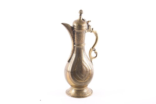 Lot 253 - A Persian (Bokhara) brass coffee pot, Qajar...