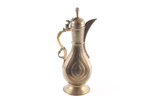 Lot 253 - A Persian (Bokhara) brass coffee pot, Qajar...