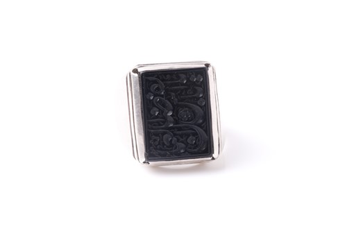 Lot 241 - An Eastern white metal and black onyx...