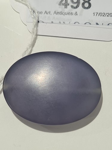 Lot 498 - A Roman-style carved amethyst glass oval...