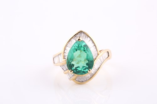 Lot 611 - An 18ct yellow gold, diamond, and emerald...