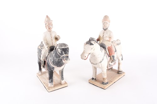 Lot 146 - A pair of Chinese equestrian funerary figures,...