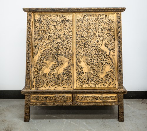 Lot 109 - A Tibetan inverted tapering lacquered cabinet,...