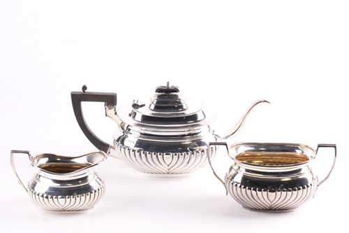 Lot 533 - A George V silver three-piece silver teaset,...