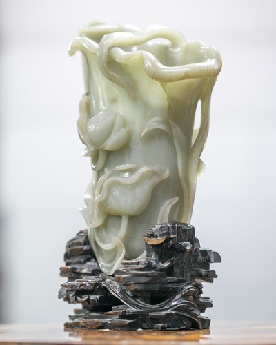 Lot 149 - A large Chinese carved celadon jade Rhyton,...