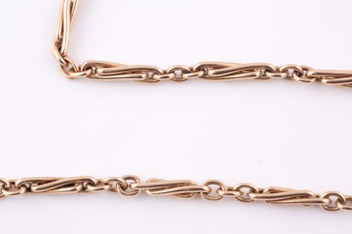 Lot 212 - A 9ct yellow gold facny twist-link necklace,...