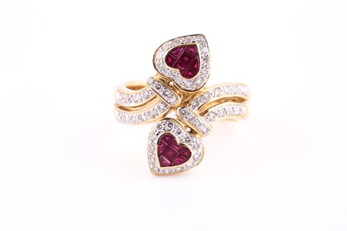 Lot 288 - An 18ct yellow gold, diamond, and ruby ring,...