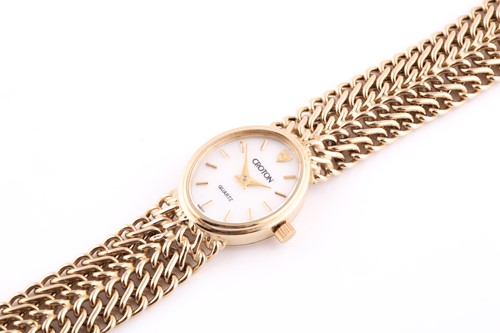 Lot 599 - A yellow metal ladies Croton watch, the mother-...