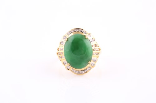Lot 168 - An 18ct yellow gold, diamond, and jade ring,...