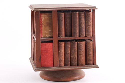 Lot 319 - A 19th-century revolving miniature bookcase,...