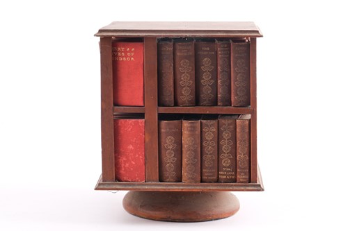 Lot 319 - A 19th-century revolving miniature bookcase,...