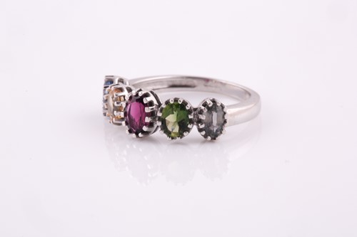 Lot 67 - A 9ct white gold and rainbow gemstone ring,...