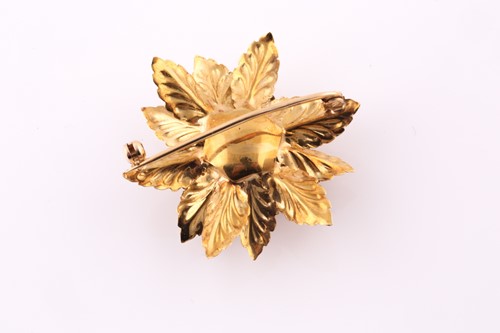 Lot 188 - An 18 carat gold rose brooch; the centre set...