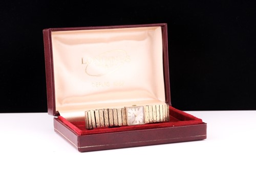 Lot 596 - A lady's 9 carat gold Longines wristwatch; the...