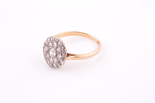 Lot 203 - An 18ct yellow gold and diamond cluster ring,...